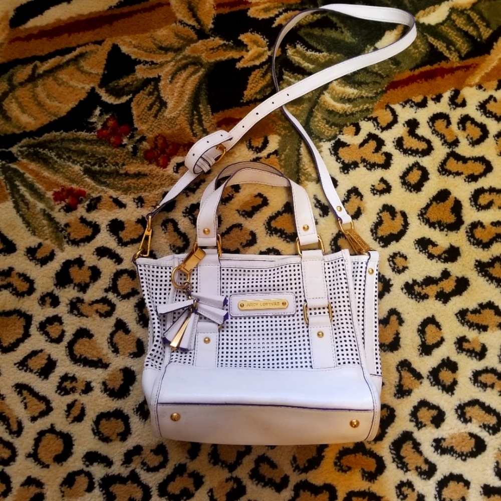 Juicy Couture Wh leather crossbody purse gold hardware purple lining.